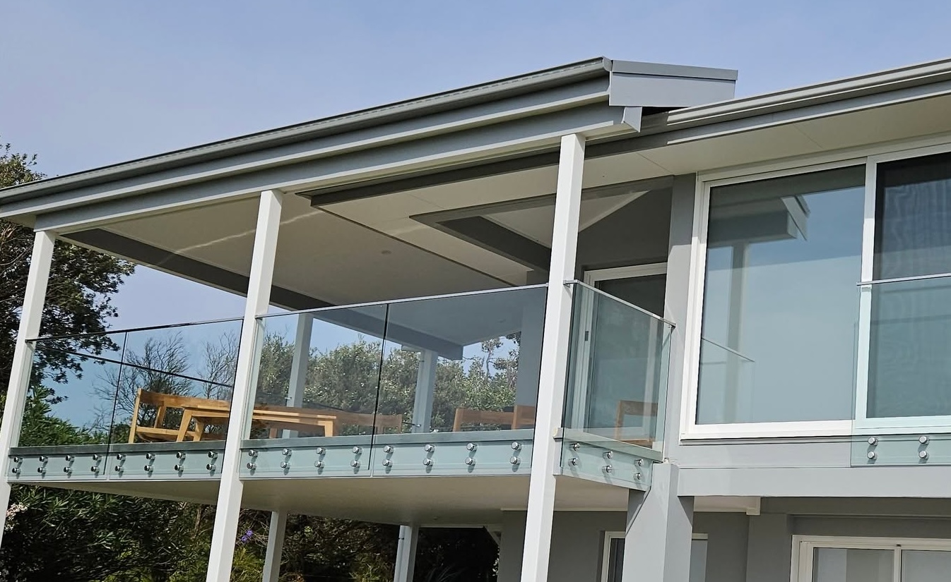 Frameless glass balcony balustrade installed on a coastal Shoalhaven home by All Hours Glass
